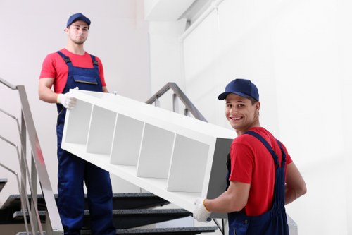 Local removals crew loading furniture for a Queenspark house move